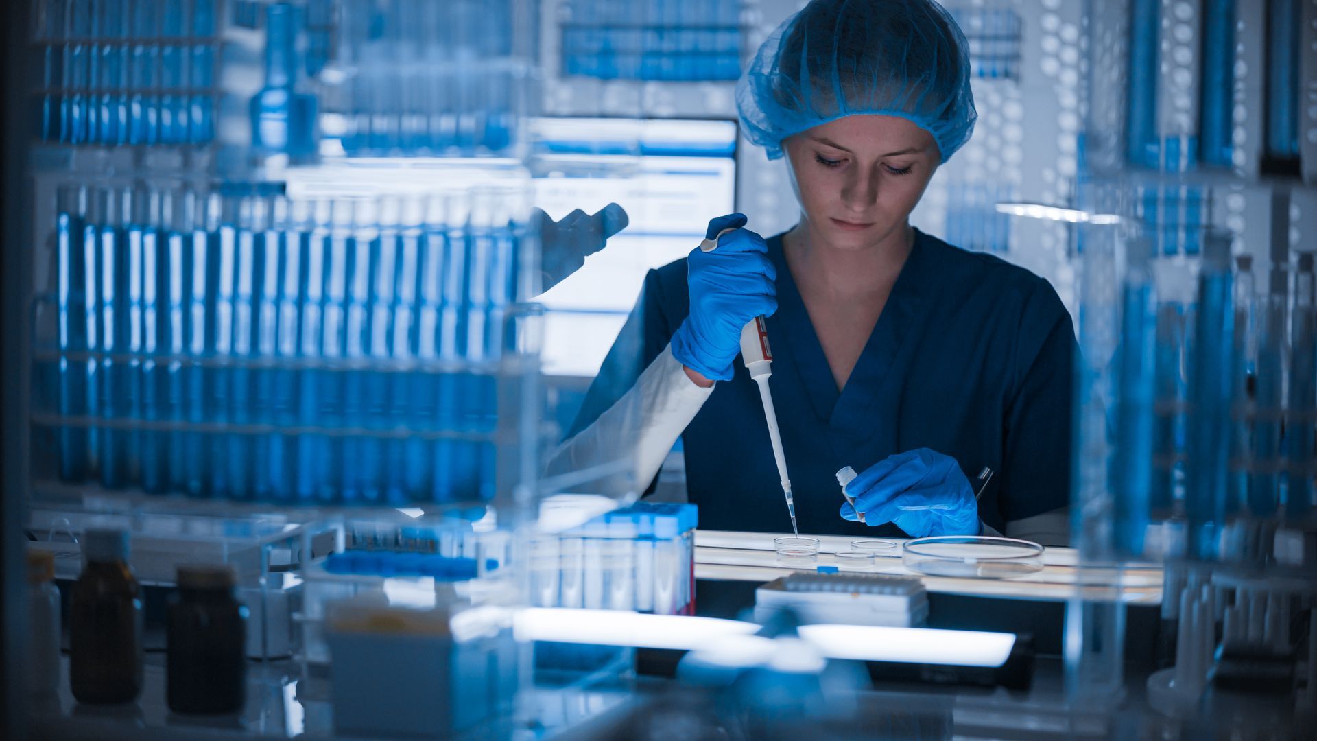 Laboratory professional reviewing quality management and compliance