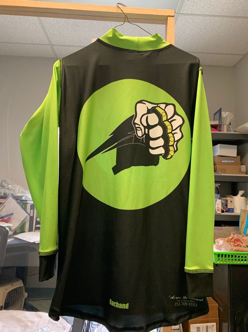 https://irp.cdn-website.com/e94188d8/dms3rep/multi/silks-green-black-fist.jpg