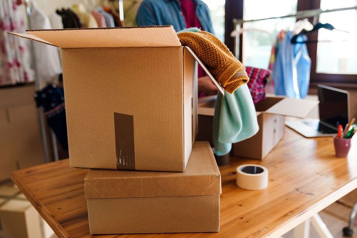close clothes cardboard box parcel ready