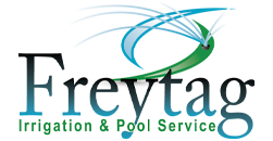 Logo for Freytag Irrigation & Pool Service: Blue-green stylized water spraying with the name "Freytag".