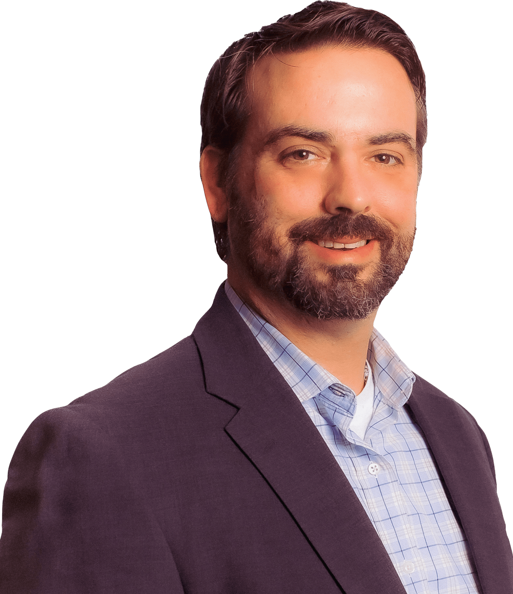 A man with a beard is wearing a suit and smiling