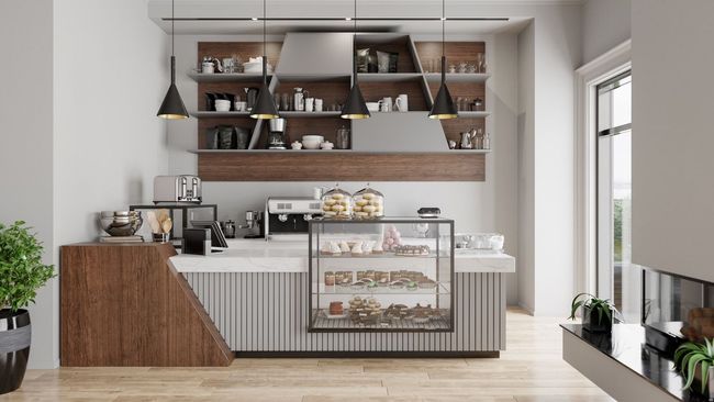 Un comptoir de café élégant et moderne avec des panneaux de bois, des étagères ouvertes, des suspensions lumineuses minimalistes et une vitrine en verre.