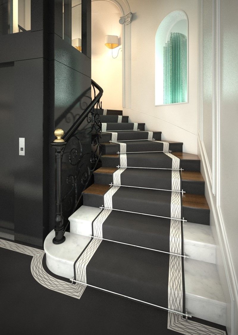 Un escalier noir et blanc avec un tapis noir réalisé par mes services d'architecte d'intérieur