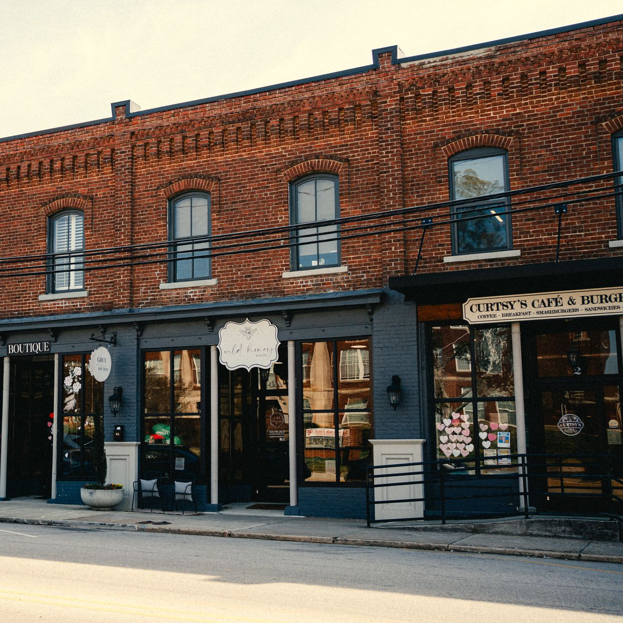 Carolina Theatre building with a columned facade and vertical