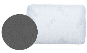 Una almohada blanca con la palabra carbón.