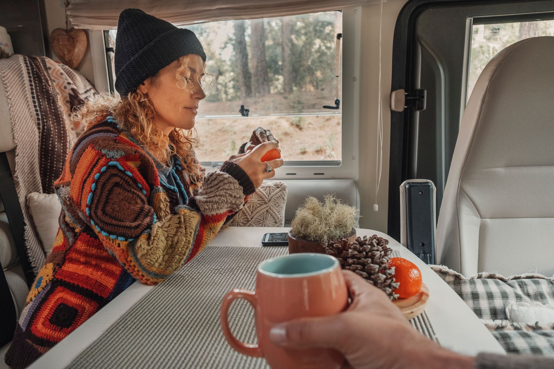 Woman enjoying camper warmth