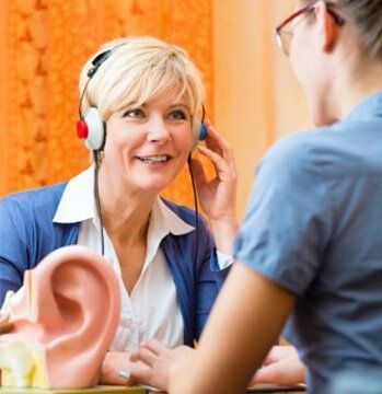 A woman doing a test for hearing aids near Deptford, NJ