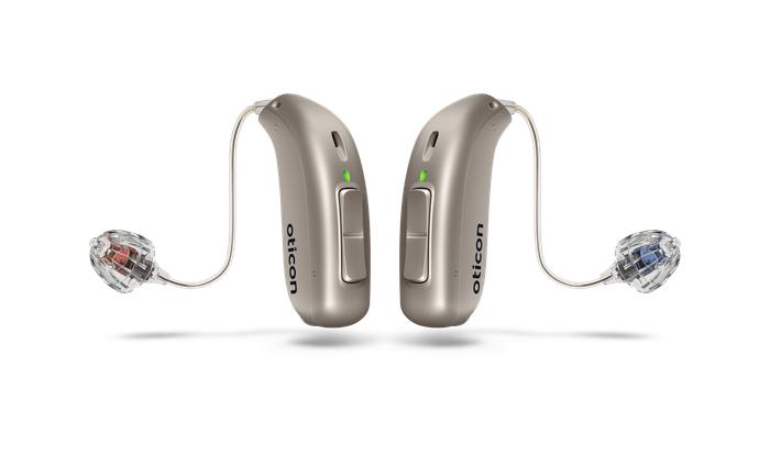 Doctor Putting An Hearing Aid In A Girl — Sewell, NJ — Hearing Hut LLC
