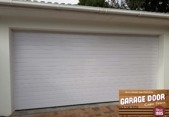 White horizontal slat garage door in a Cape Town building.