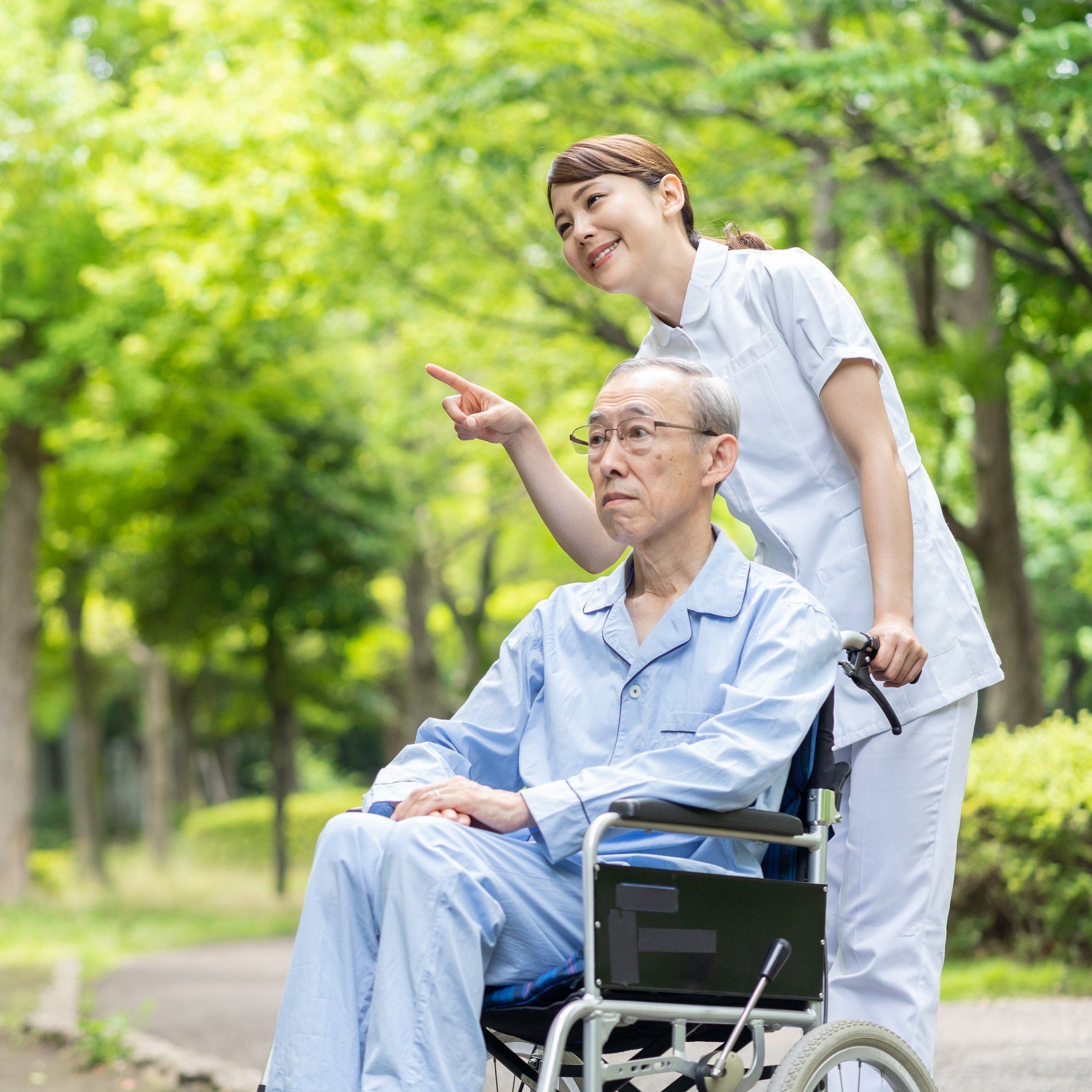 Caregiver takes memory care facility resident outside