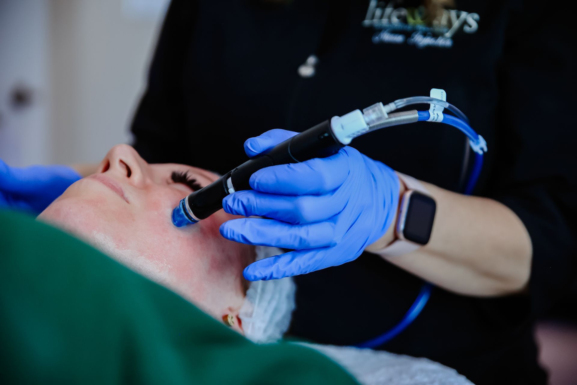 woman getting a hydrafacial done