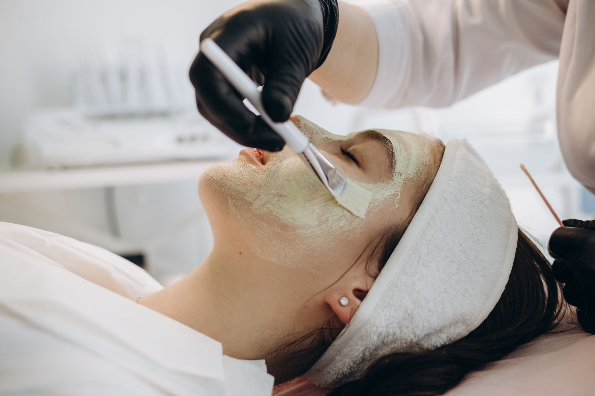 facial mask application on woman