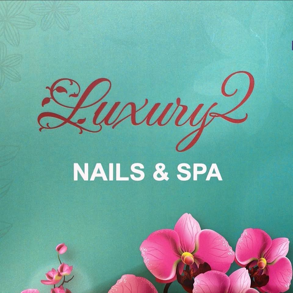 Luxury2 Nails & Spa logo on teal background with pink orchids and floral accents