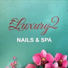Luxury2 Nails & Spa logo on teal background with pink orchids and floral accents