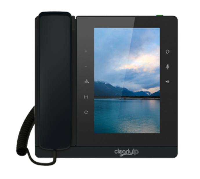 A black telephone with a picture of a lake on the screen