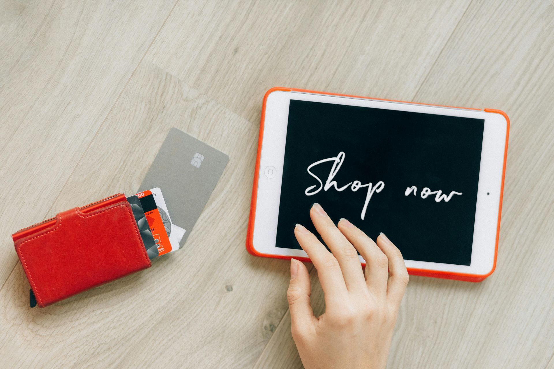 Red wallet and tablet with 