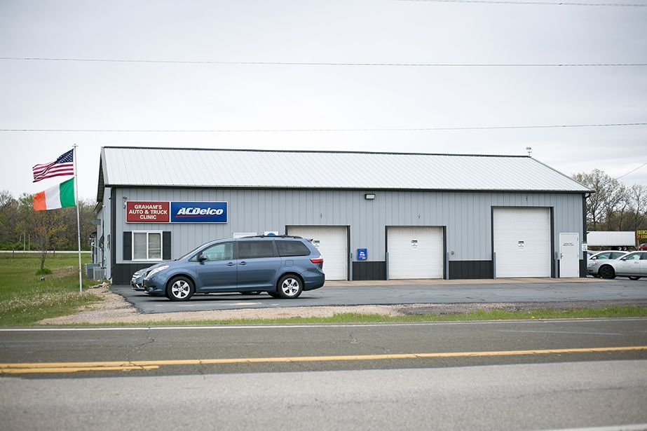 blue car at parking | Grahams Auto & Truck Clinic