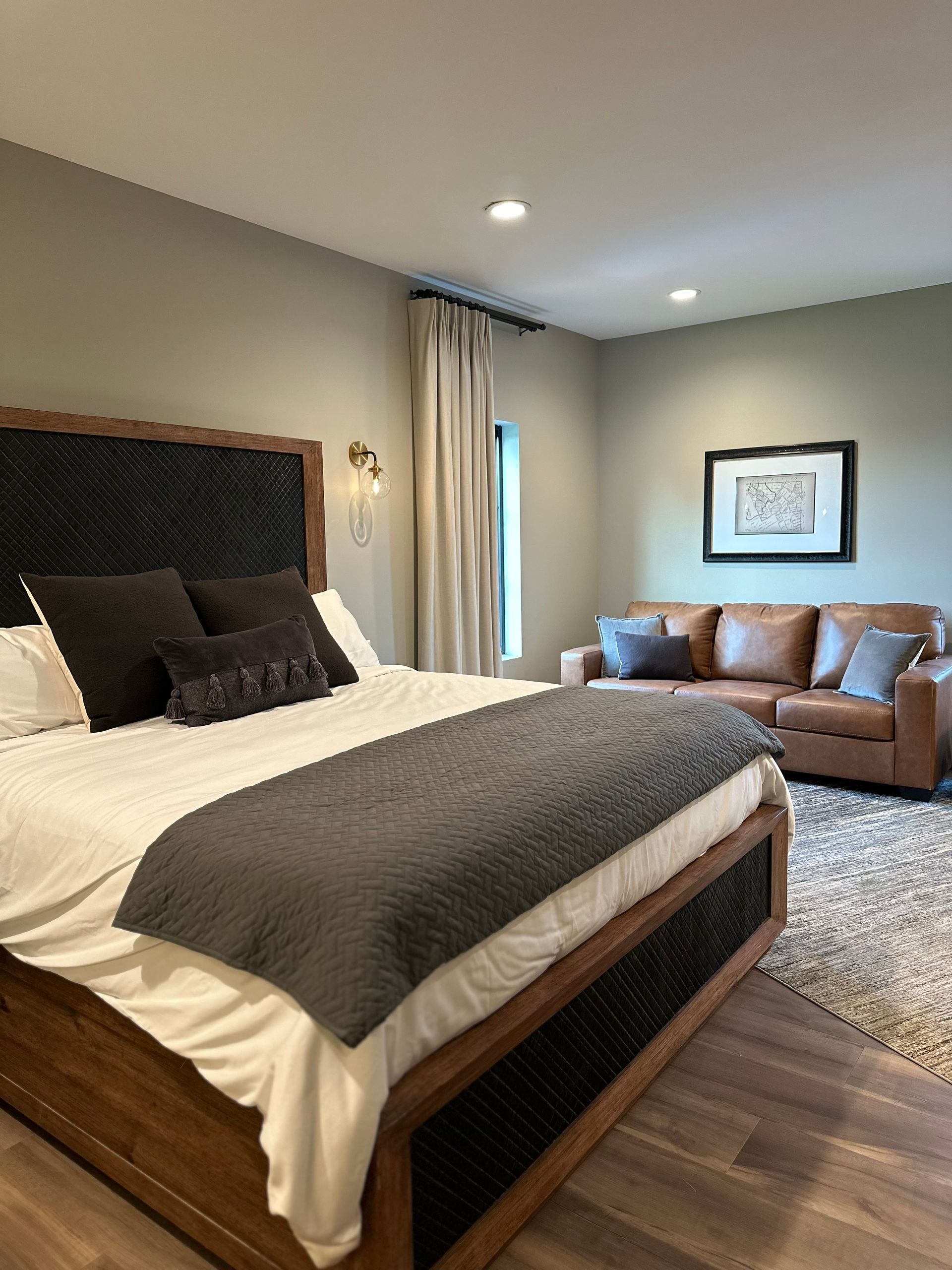 Room 204 this room is ADA compliant featuring a king bed and queen pull out sofa.