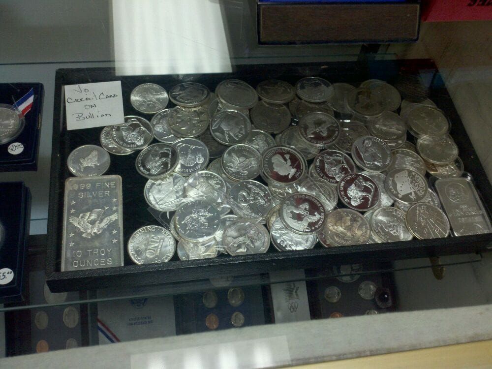 Silver Coins and a Silver Bar — Orange, CA — Patchin's Coin Gallery Inc.