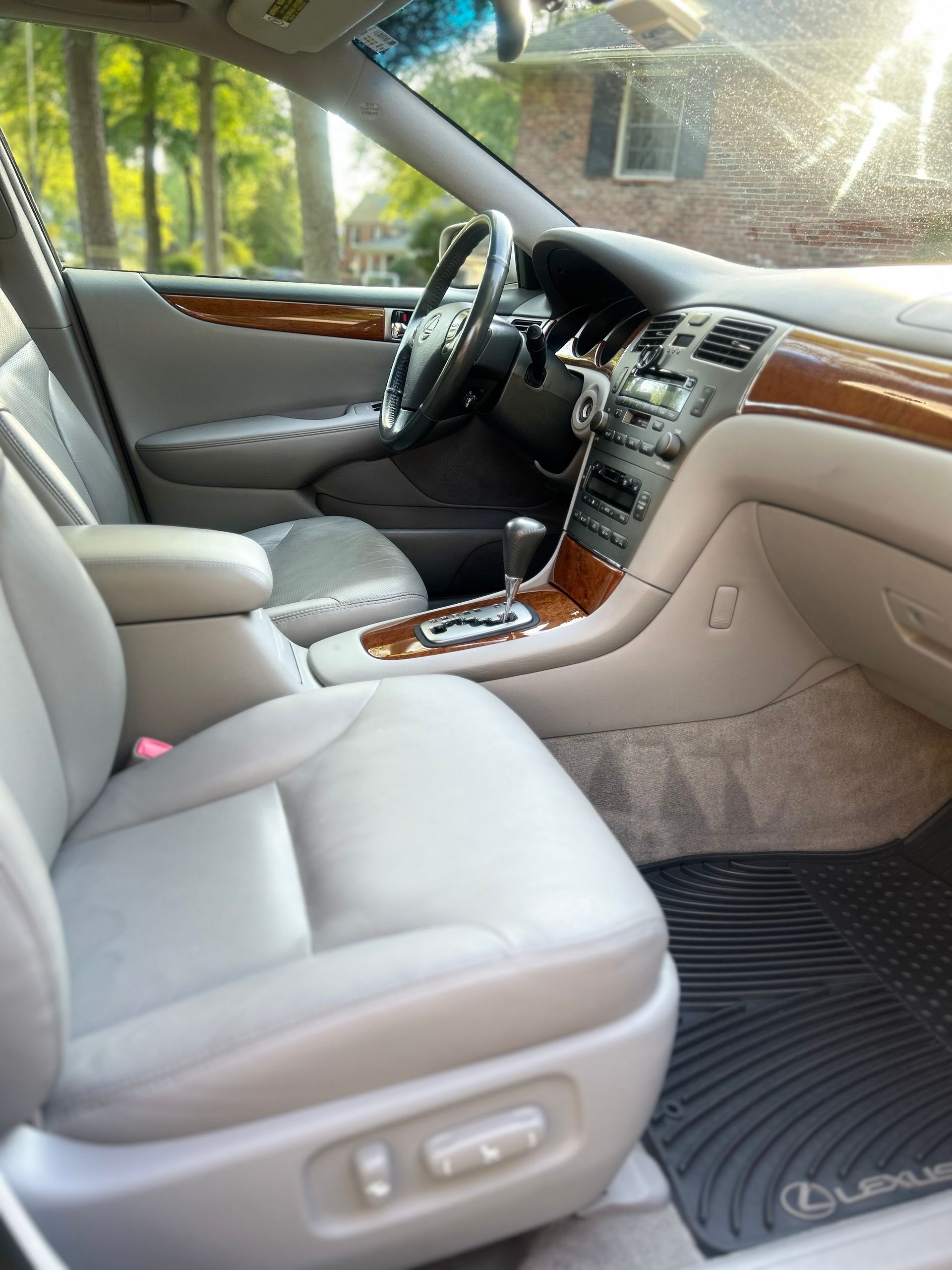 Honda Accord driver area after interior detailing with sanitized touchpoints and restored surfaces.