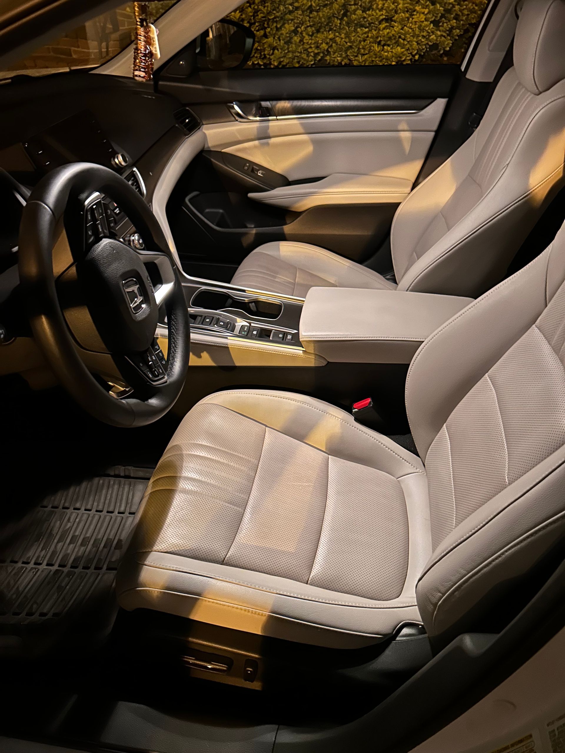 Honda Accord interior after full detail, with clean seats, dust-free vents, and a streak-free display.