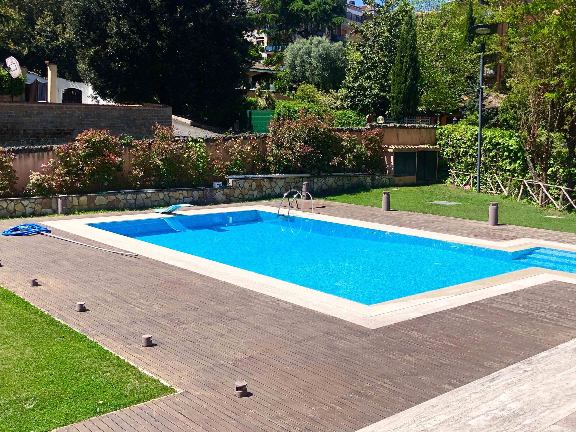 A newly-installed pool in a backyard
