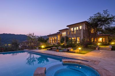 A huge custom pool built by the best pool builders in Garland, TX