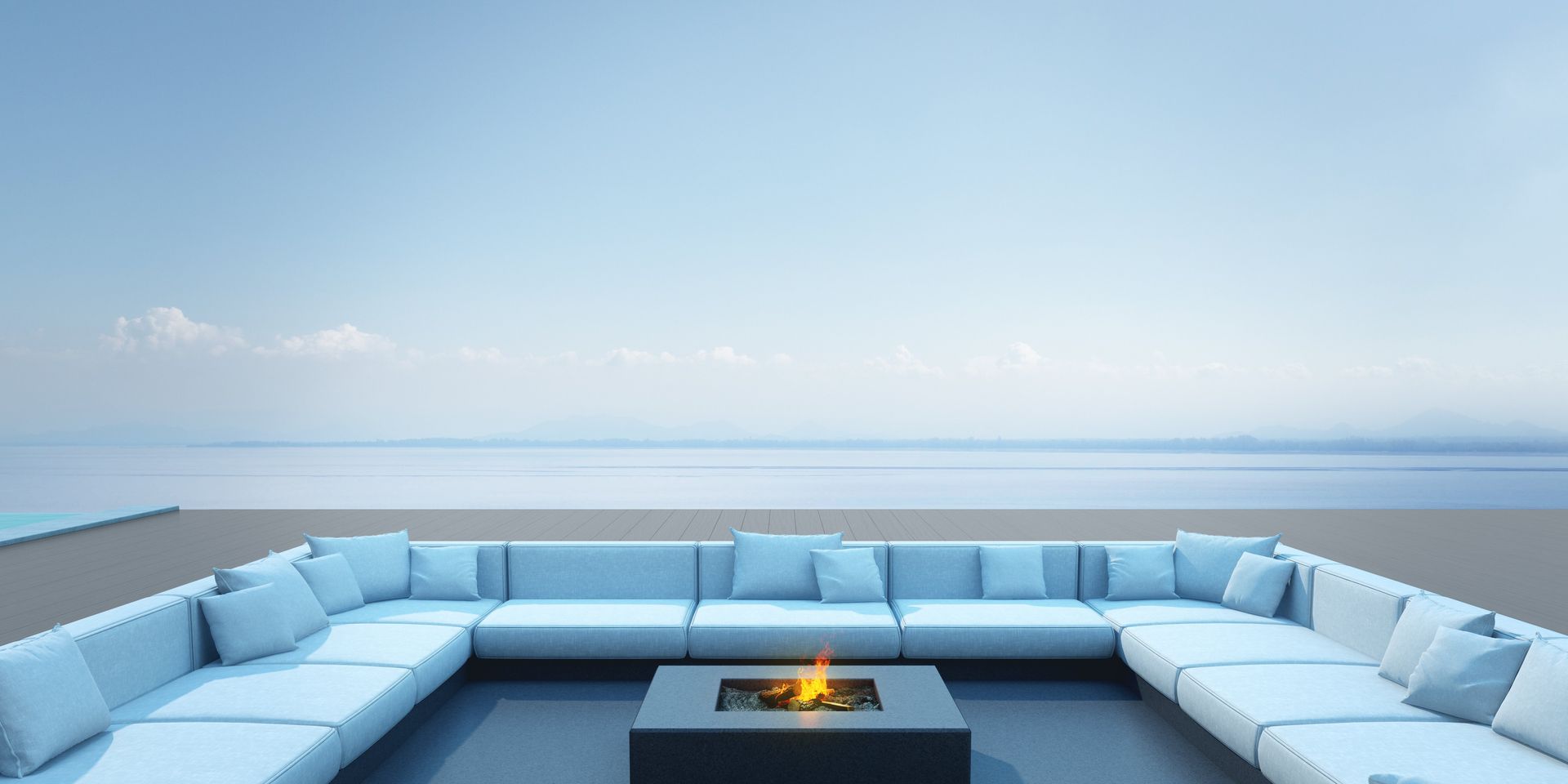 An outdoor living space that features a fire place on a deck by a Southlake pool