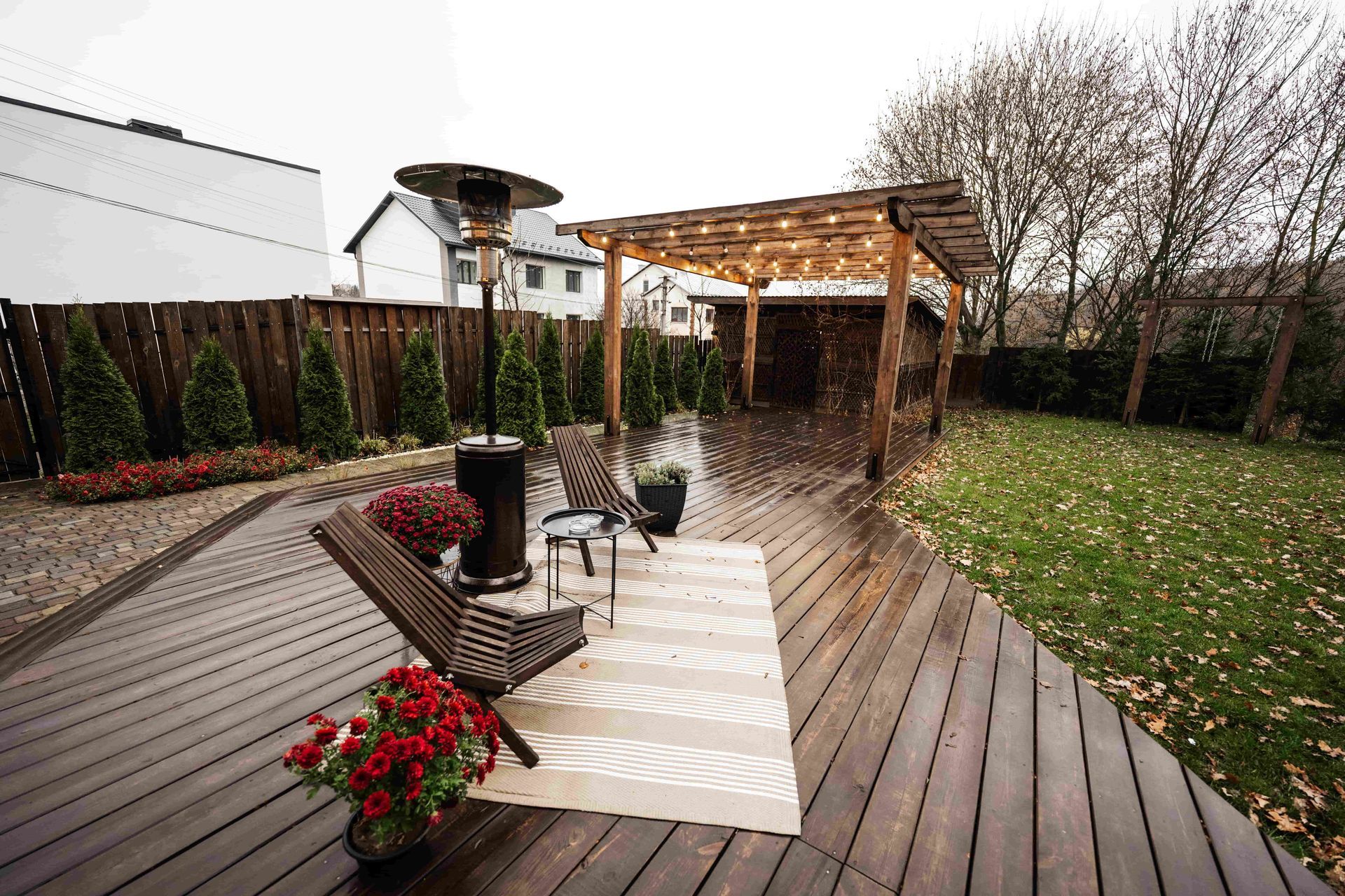 A patio cover with outdoor lights on it
