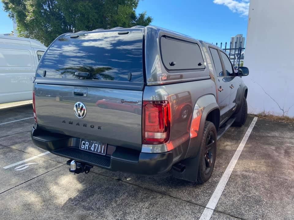 A Grey Ute with A Tow Bar k Is Parked in A Parking Lot — Motor Accessories Direct In Tweed Heads South, NSW