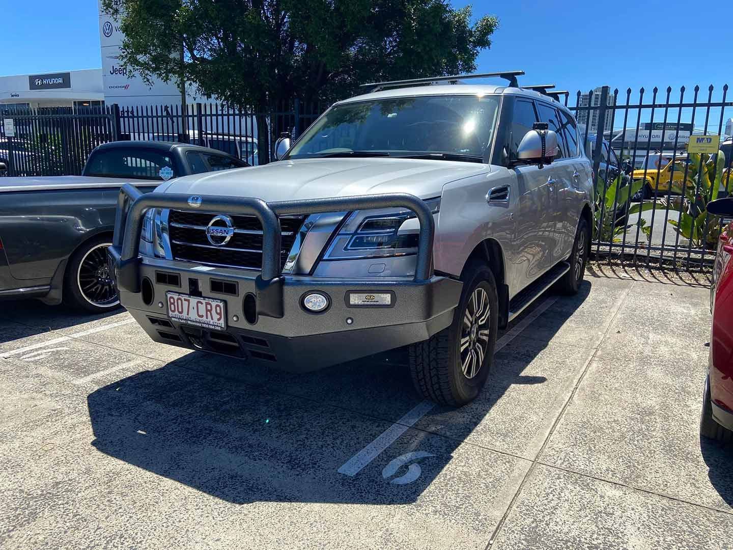 A Silver Nissan Patrol Is Parked in A Parking Lot — Motor Accessories Direct In Tweed Heads South, NSW
