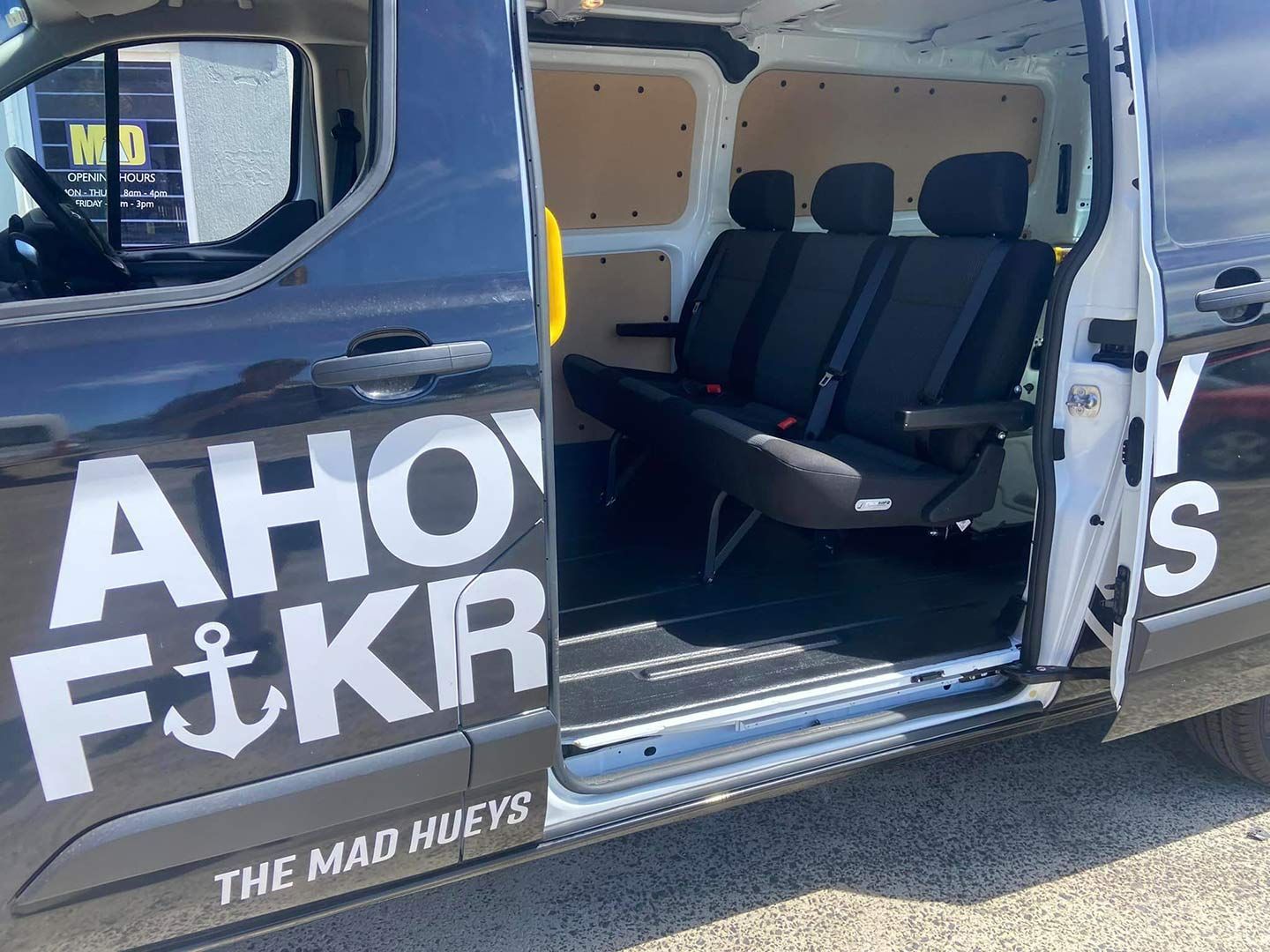 The Inside of A Van with The Door Open and The Word Ahoy on It — Motor Accessories Direct In Tweed Heads South, NSW