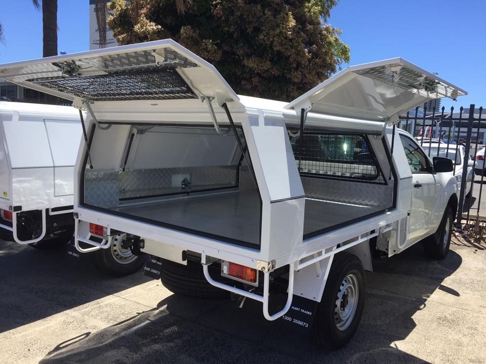 White Utility Truck With Open Canopy Doors — Motor Accessories Direct In Byron Bay, QLD