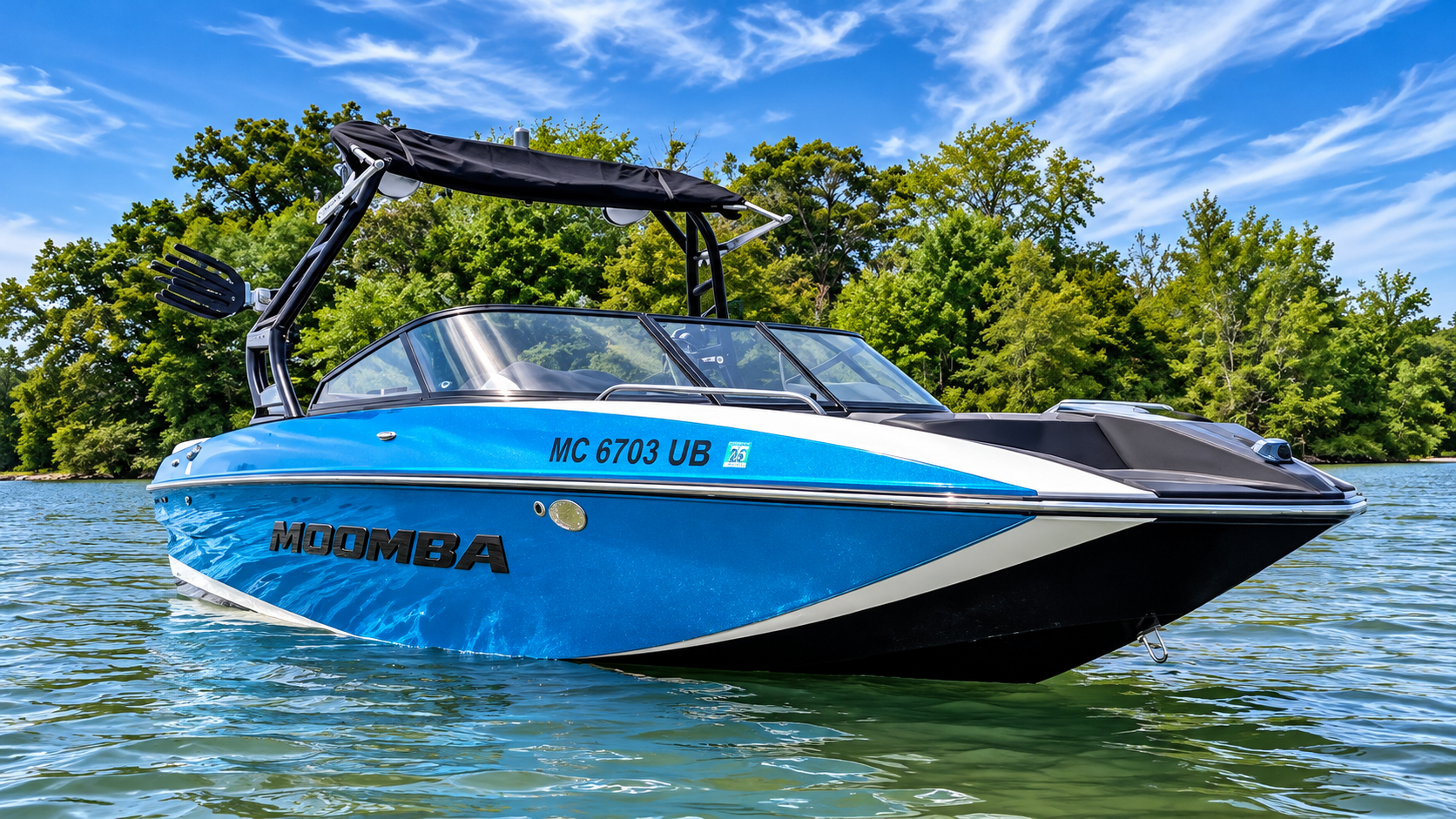 Blue Yamaha jet ski floating on calm lake water with trees and blue sky in the background