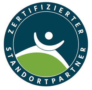 A blue and green logo that says zertifizierter standortpartner