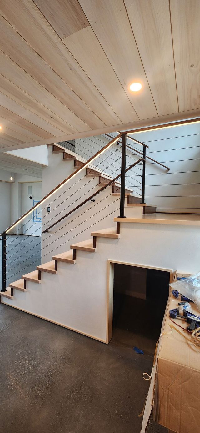 Interior cable railing on an open staircase