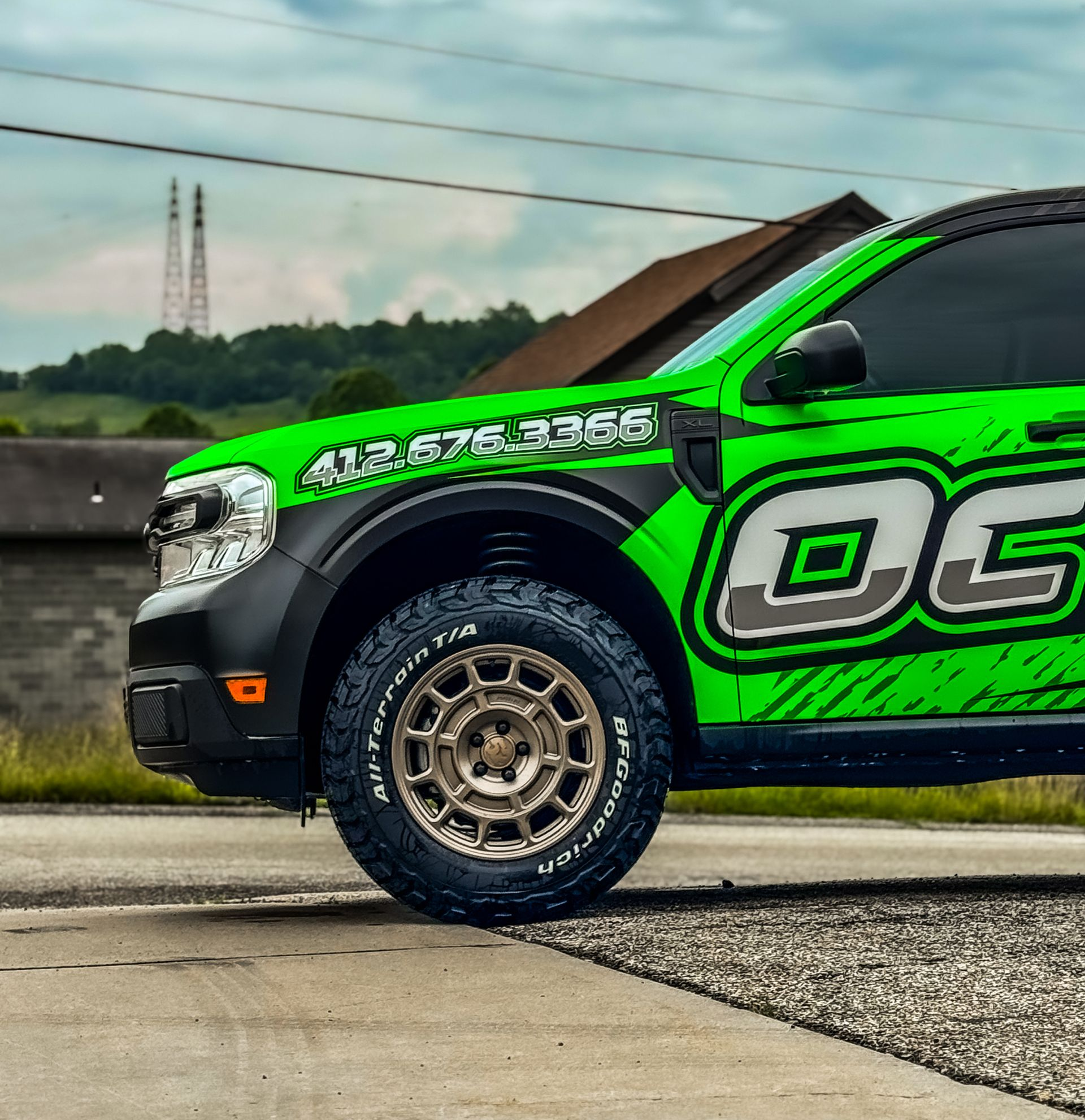 Green and black truck with 