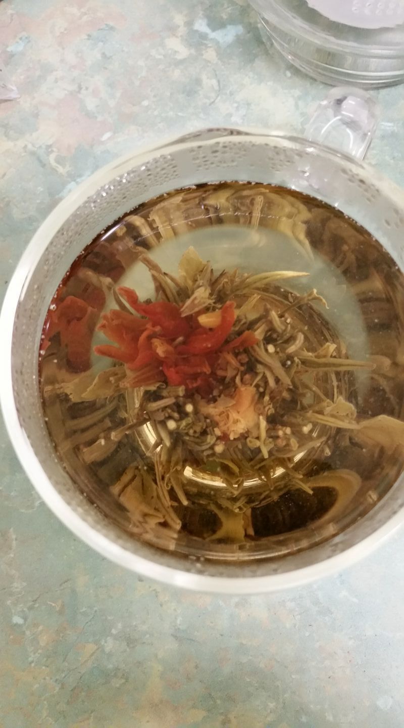 A Close Up of a Bowl of Soup With a Flower in It on a Table — Atherton Health Food Centre in Atherton, QLD