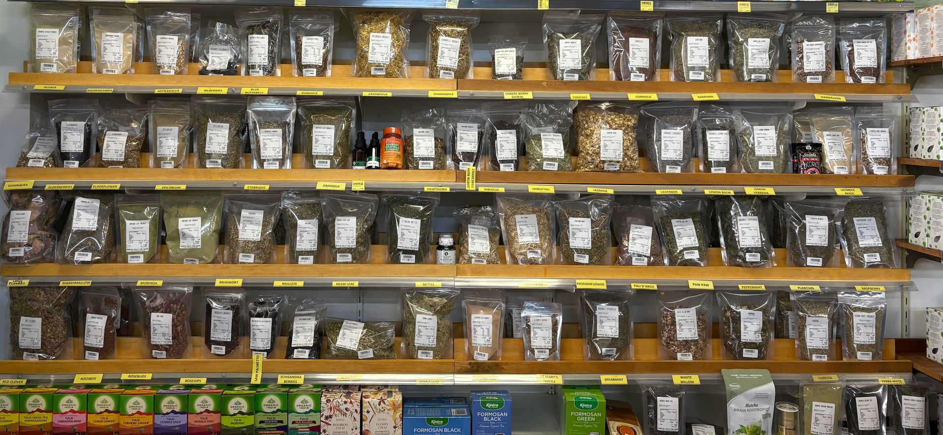A Store Shelf Filled With Lots of Bags of Food — Atherton Health Food Centre in Atherton, QLD
