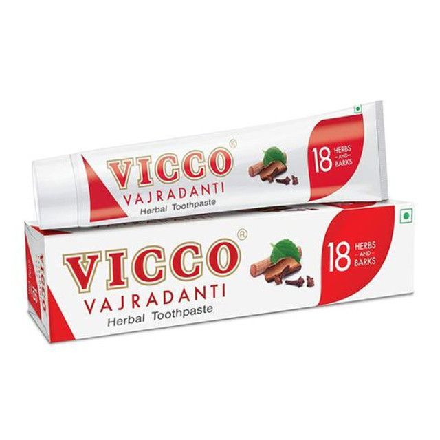 Two tubes of vicco vajradanti herbal toothpaste are stacked on top of each other. — Atherton Health Food Centre in Atherton, QLD
