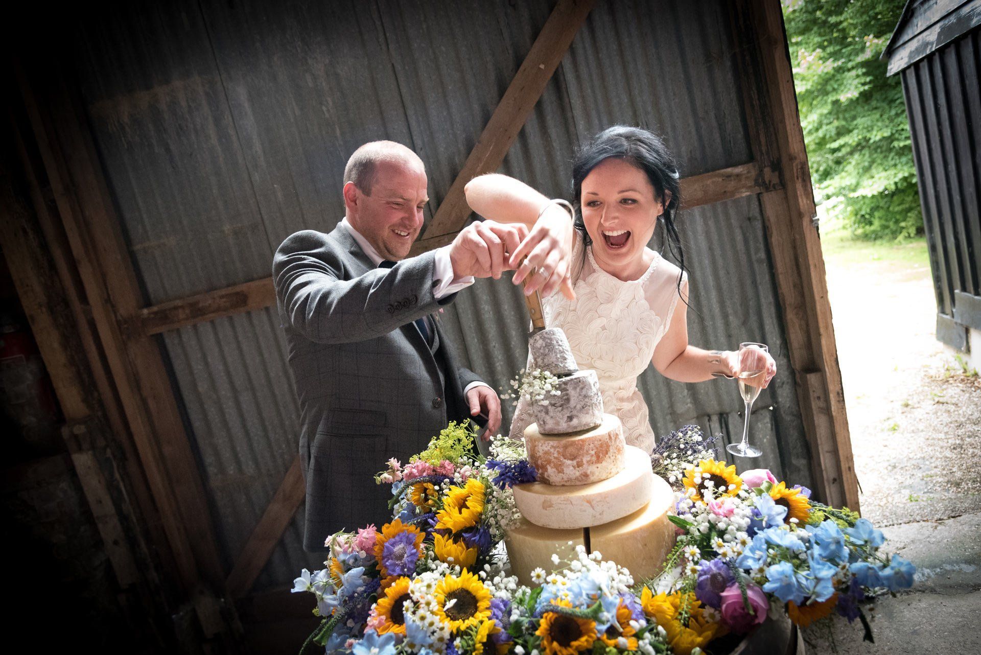 Southampton wedding photography of bride and groom with wedding cake