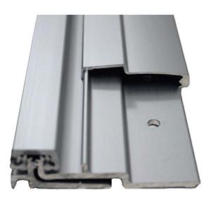 Hinges & Pivots - A close up of a metal door frame on a white background.