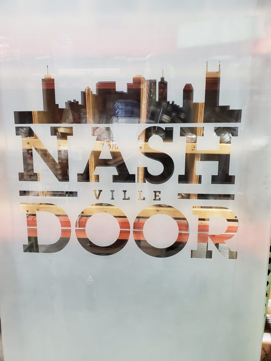 Storefronts & Glass Doors Installation and Repair - A sign that says nashville door on it