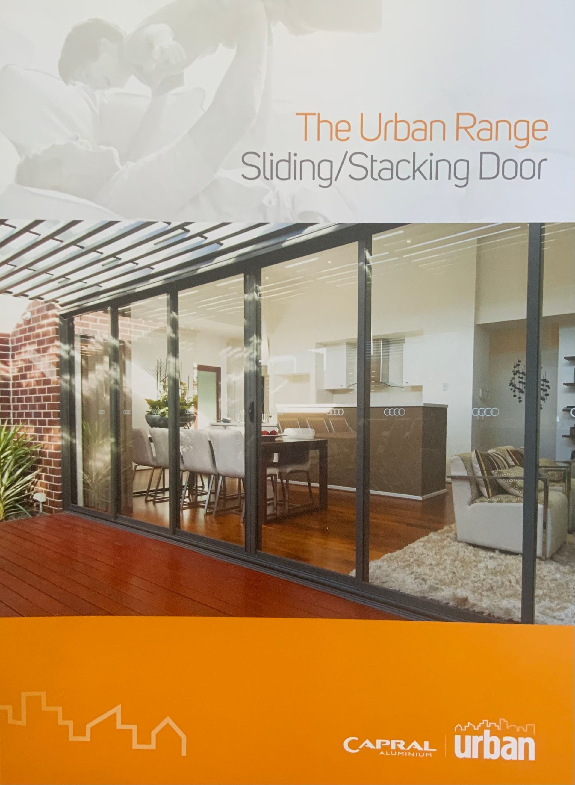 Modern Glass Sliding Door Opening to a Patio — Glass & Aluminium Windows & Doors In Yeppoon, QLD