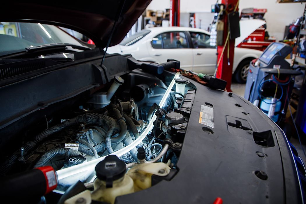 Light in hood of vehicle for repairs in Centerville, UT | Baker Automotive
