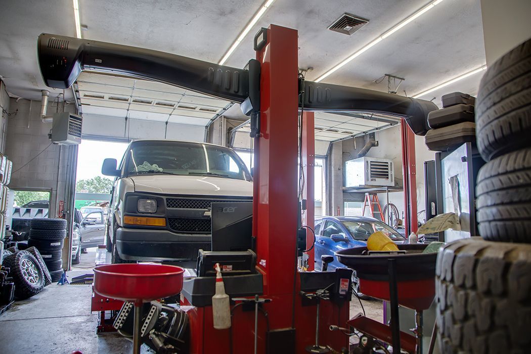 White truck parked in our garage in Centerville, UT | Baker Automotive