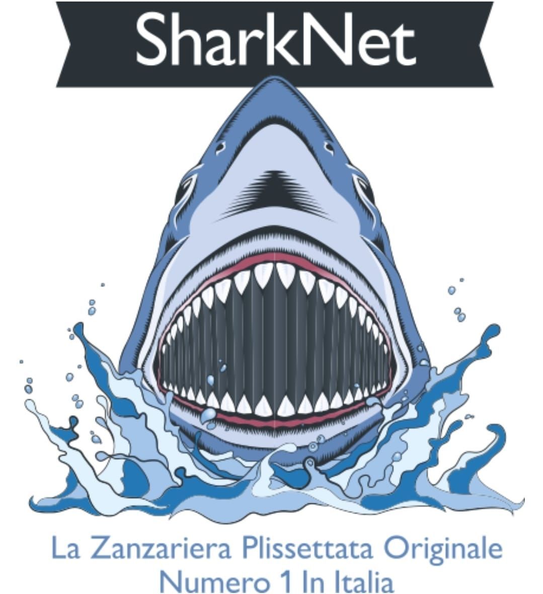 Shark logo with open jaws, water splash. Text 