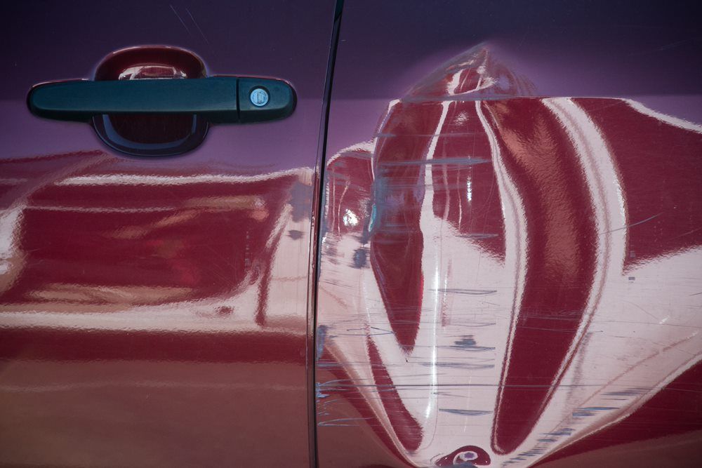Car With Big Dent — Panel Beater In Goondi, QLD