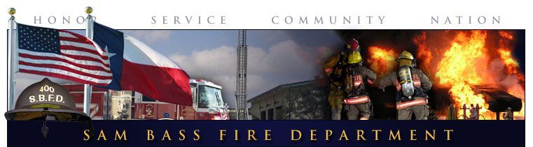 A banner for the Sam Bass fire department shows firefighters fighting a fire