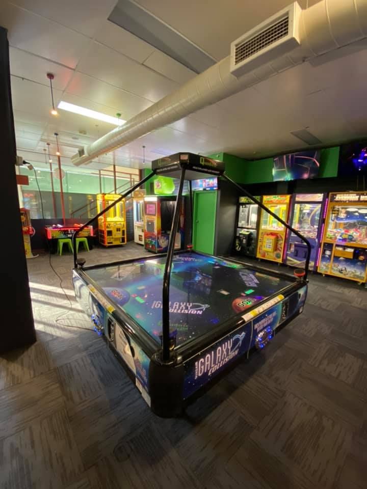 A Games room with Air Hockey in the center — Laser Tag Wagga In Wagga Wagga, NSW